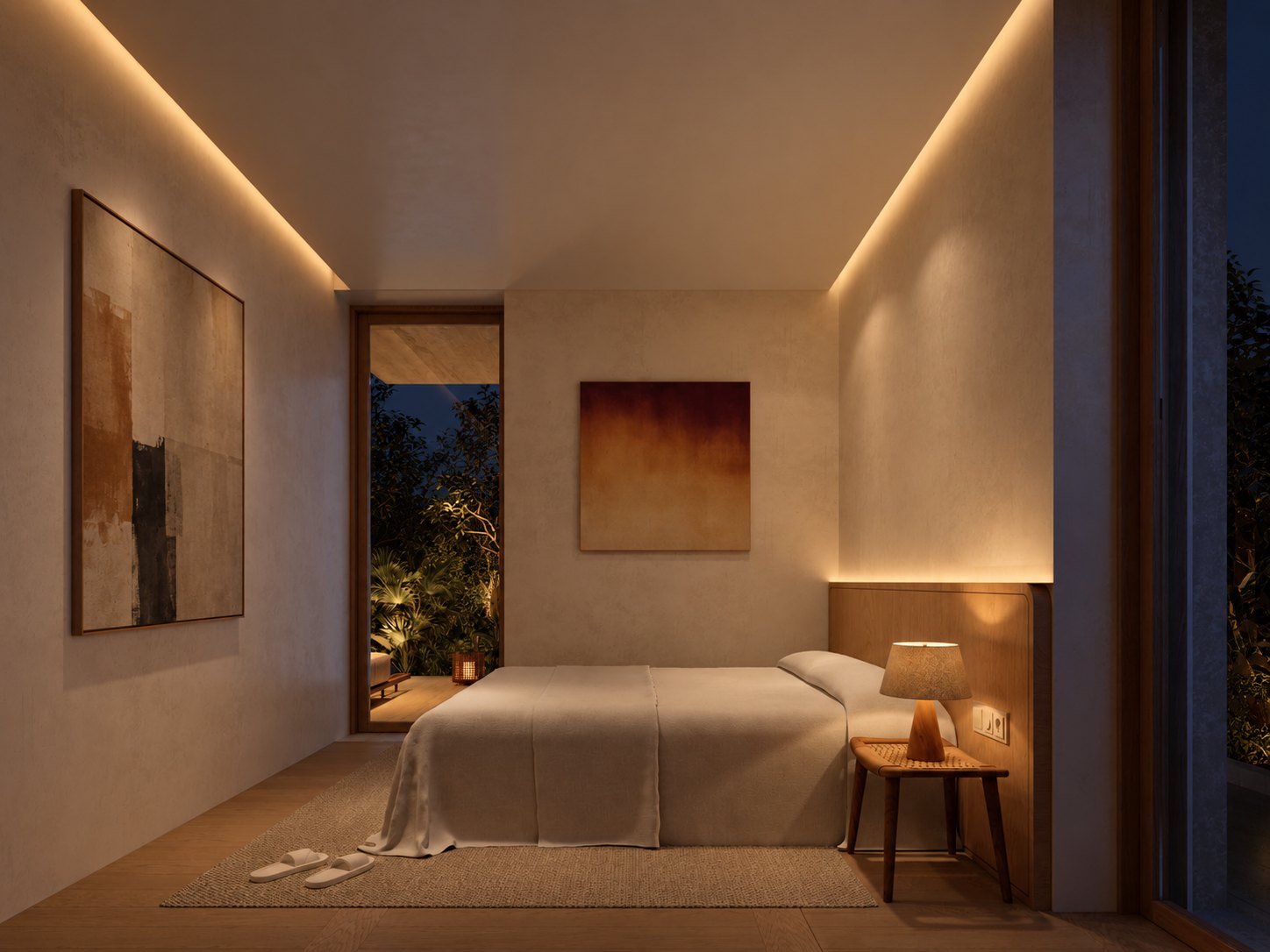 A bedroom at night, softly lit plaster walls and a door open to the garden